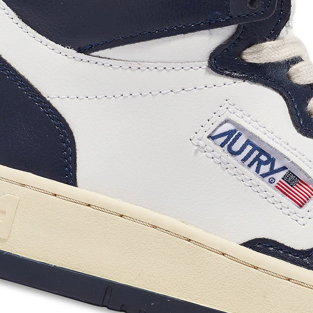 AUTRY - Basket Medalist Mid Bicolor cuir blanc / bleu