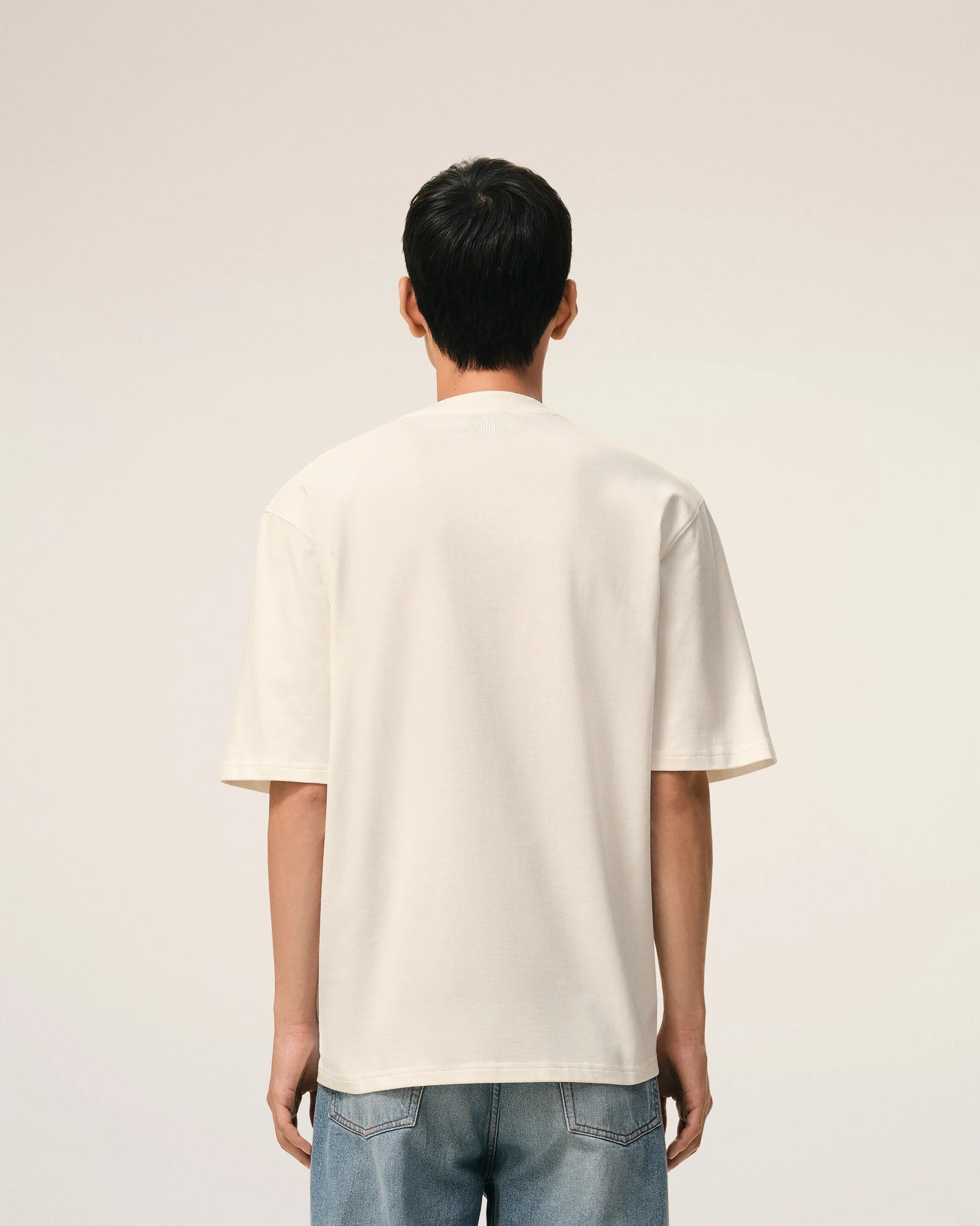 AMI - T-shirt Ami de coeur embossé Blanc Crème